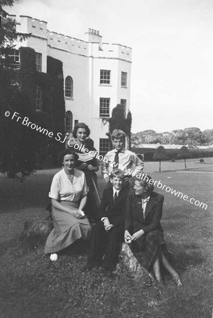 GLIN CASTLE  GROUP IN GARDEN  MADAME AND DESMOND